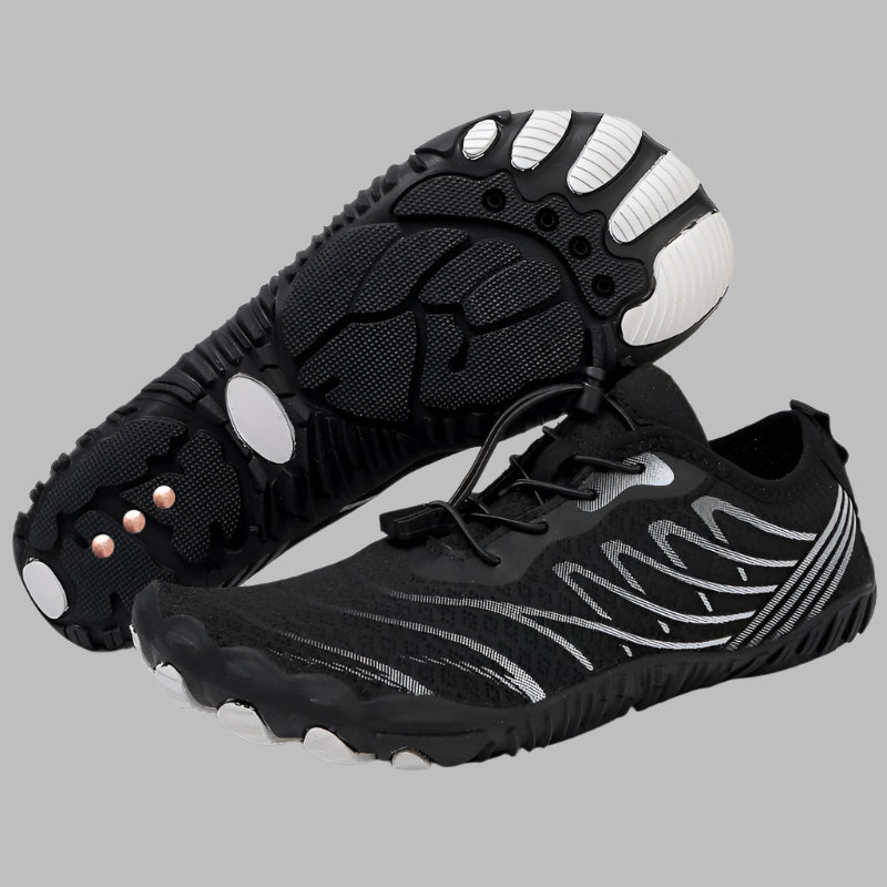 Black and white barefoot running shoes with unique sole design on a white background