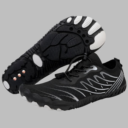 Black and white barefoot running shoes with unique sole design on a white background