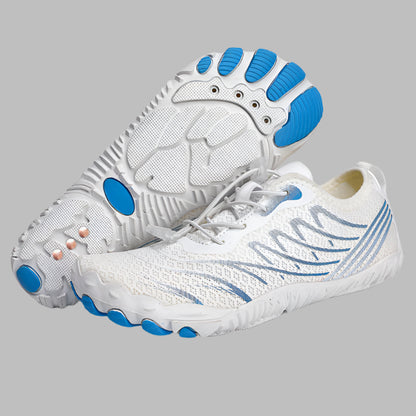 White and blue athletic shoes on a white background