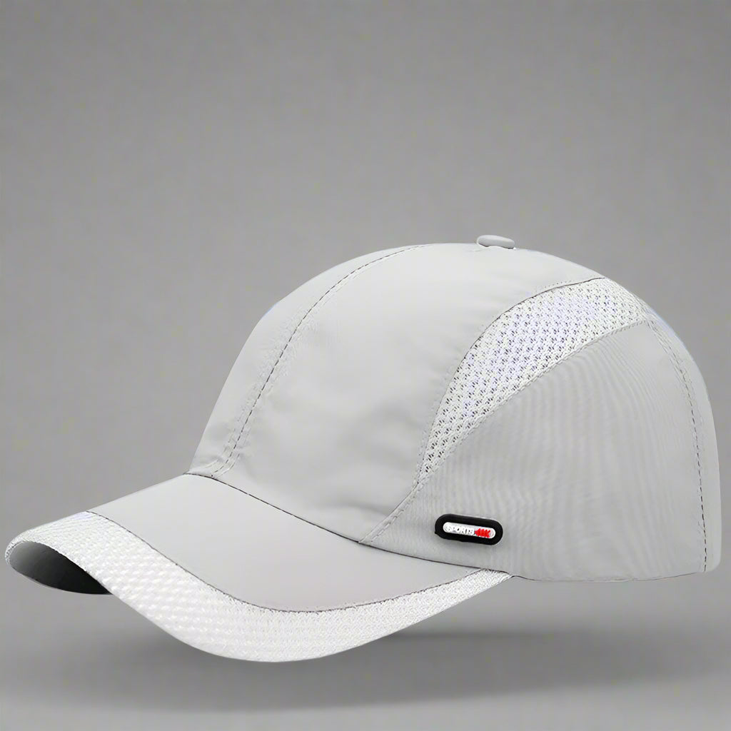 Gray baseball cap with mesh design on a blue background