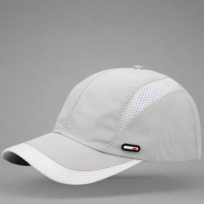 Gray baseball cap with mesh design on a blue background